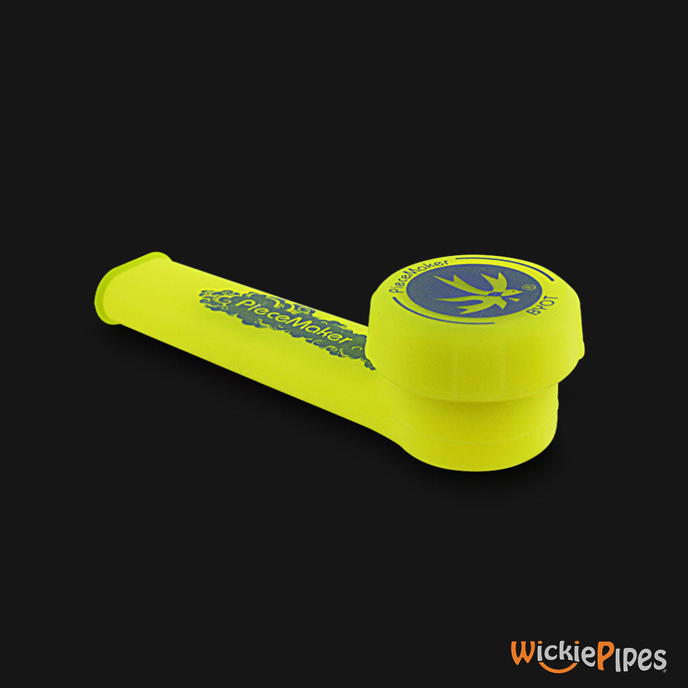PieceMaker - Karma Hazard Flag Yellow 3.5-Inch Silicone Hand Pipe with front cap on.