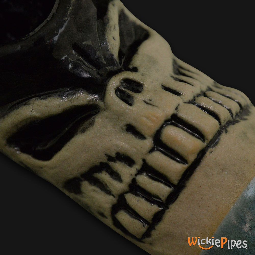 JM Ceramics Small Skull Ceramic Hand Pipe detailed.