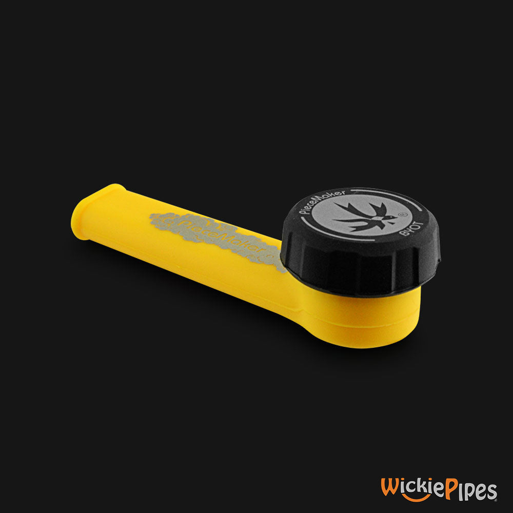 PieceMaker - Karma Giallo Yellow 3.5-Inch Silicone Hand Pipe with front cap on.